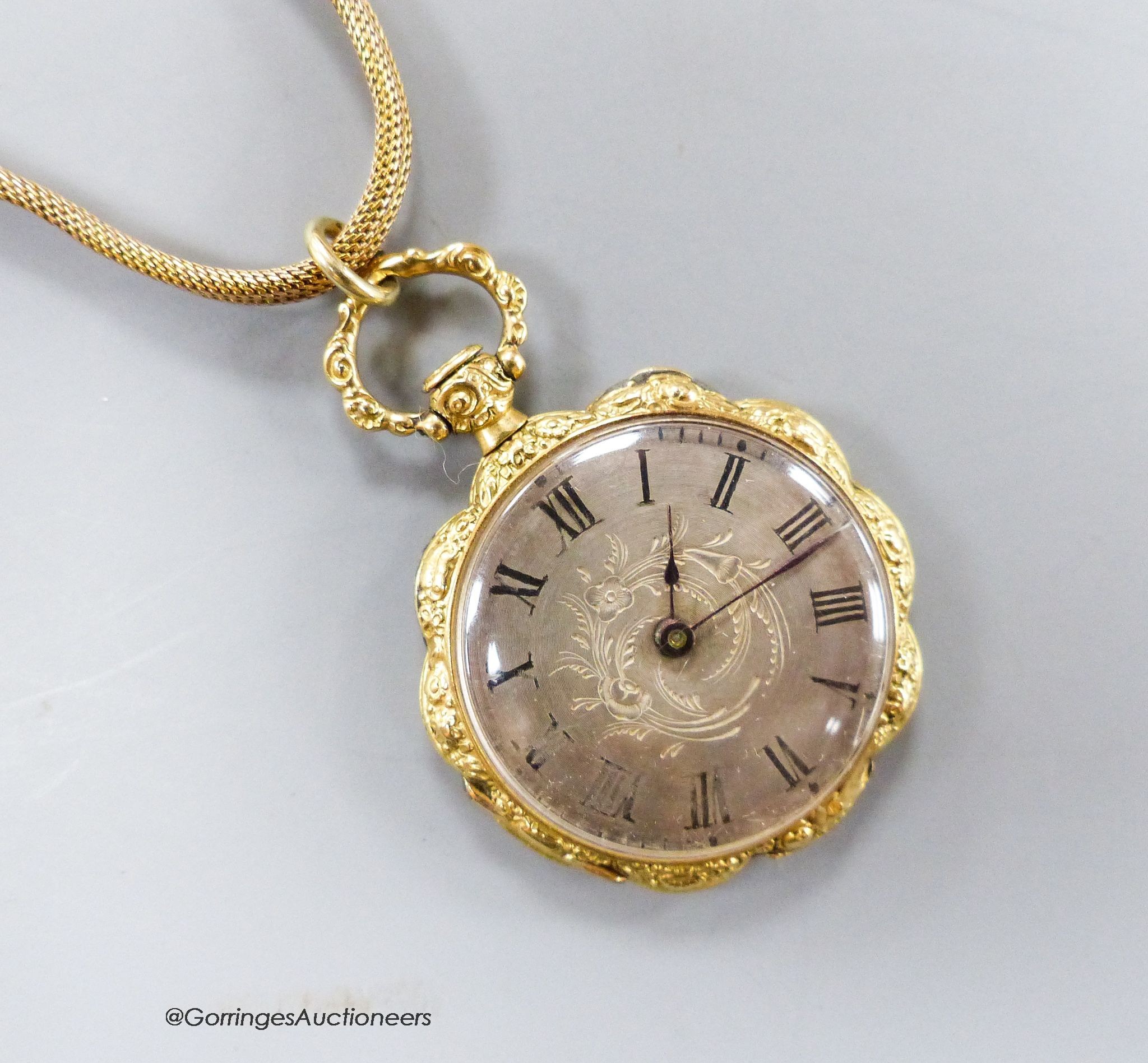 A lady's late 19th century enamelled yellow metal open faced fob watch (soldered shut), on a yellow metal snake link chain, gross 20.4 grams.